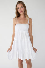 SMOCKED TIERED MINI DRESS