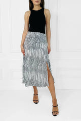Honor Gold Eden Black & White Polka Dot Midi Skirt With An Asymmetrical Hemline