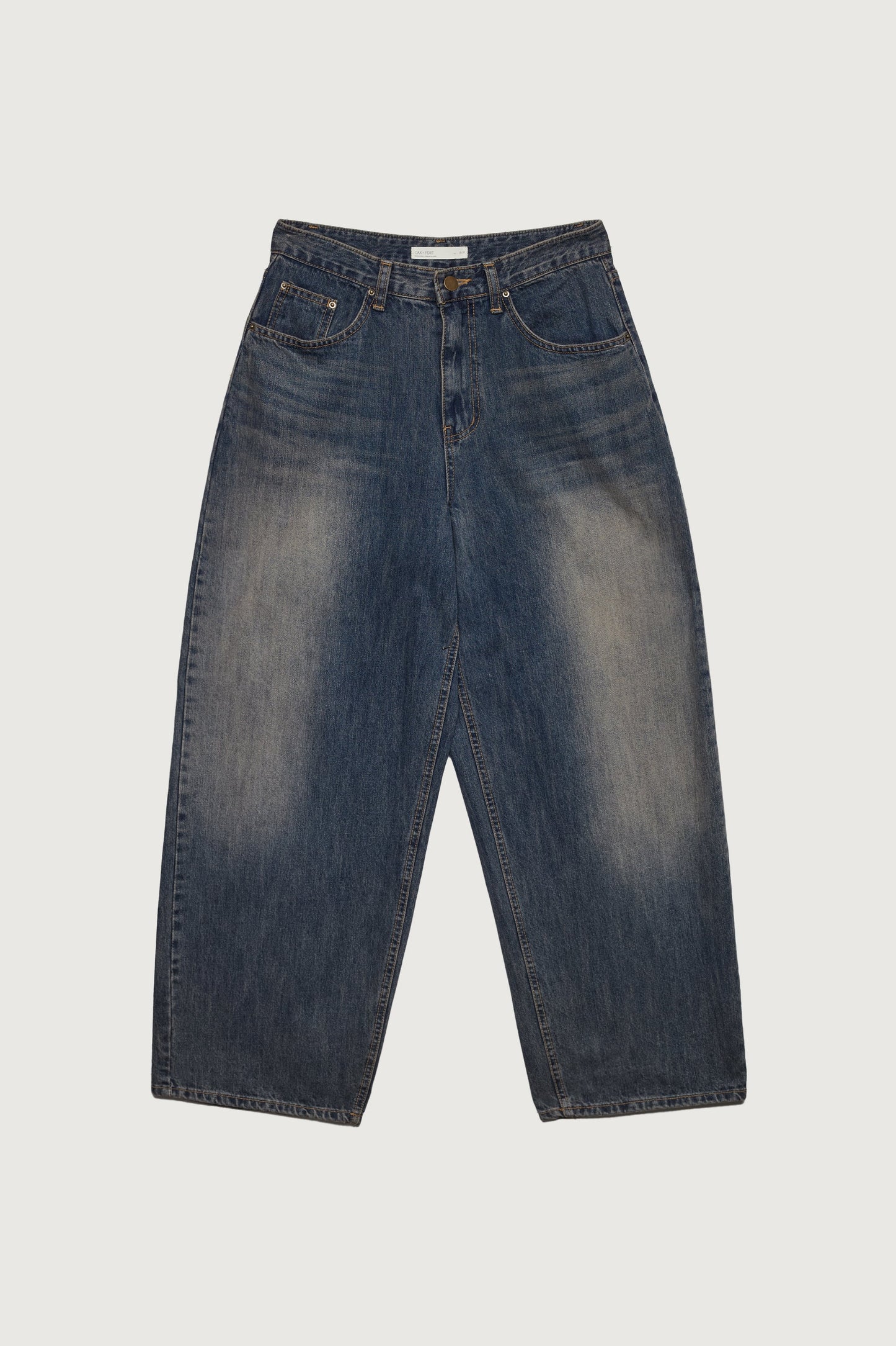 MID-RISE CURVED LEG DARK WASH JEAN