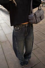 LINE STITCH BARREL CURVED LEG JEAN