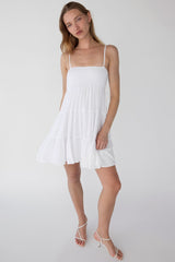 SMOCKED TIERED MINI DRESS