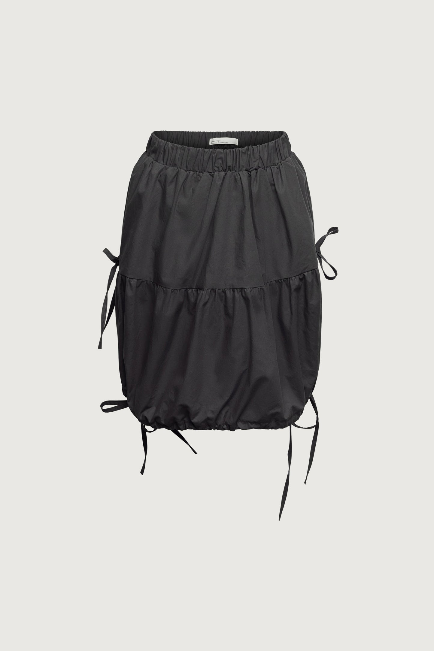 TIERED BOW MINI SKIRT