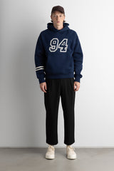 RELAXED VARSITY GRAPHIC HOODIE